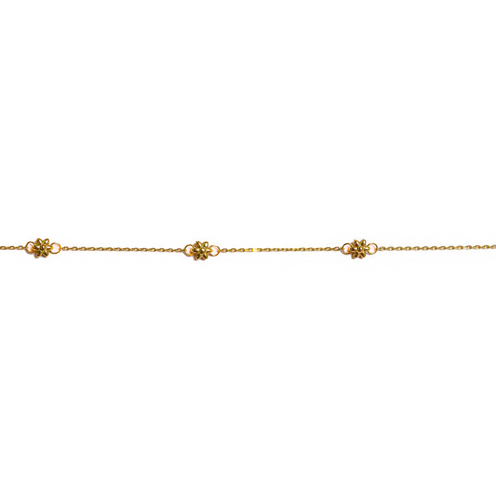 Pulsera con dijes flor detalles
